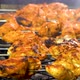 Cooking barbecue  chicken tikka charcoal grill stock video - VideoHive Item for Sale