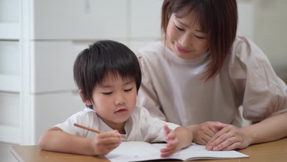 Parents and children studying