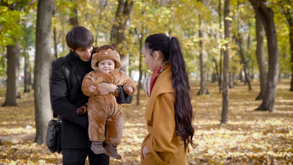 Husband And Wife After Work In The Woods To Spend Time With Your Child.