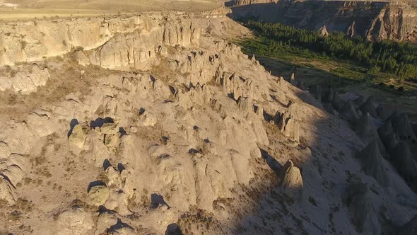 Hoodoos, Fairy Chimneys and Sedimentary Volcanic Rock Formations in Eroded Stone Valley