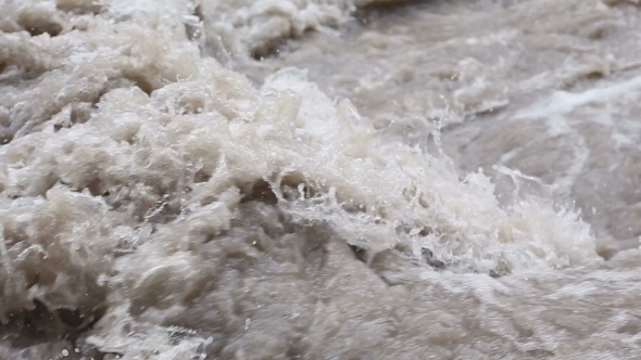 Water Beating Against The Rocks