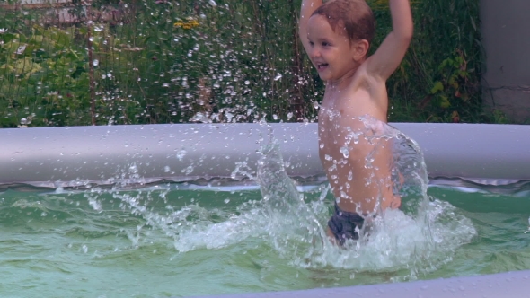 Infant Swimming At The Open Air
