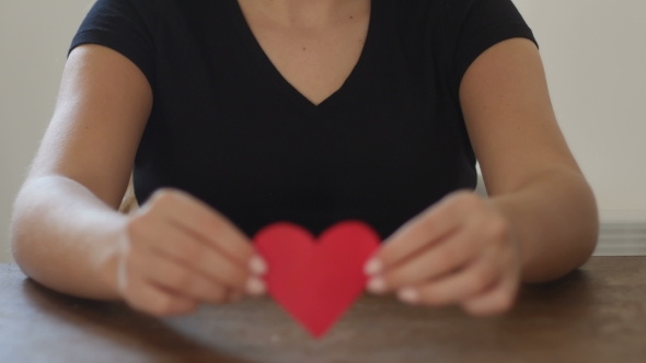 Female Hands Holding Red Paper Heart, Valentine's Day