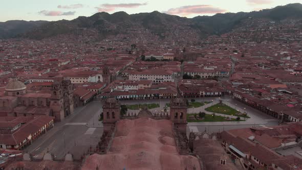 4K aerial drone view over the empty Plaza de Armas in the city centre of Cusco, capital of the Incas