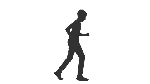 Silhouette of Running Teenage Boy in Casual Wear alt