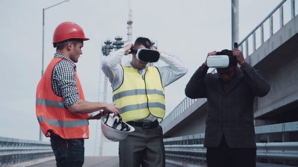 Architects Discussing Project In Virtual Reality Headset