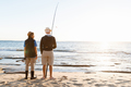 Senior man fishing with his grandson - PhotoDune Item for Sale