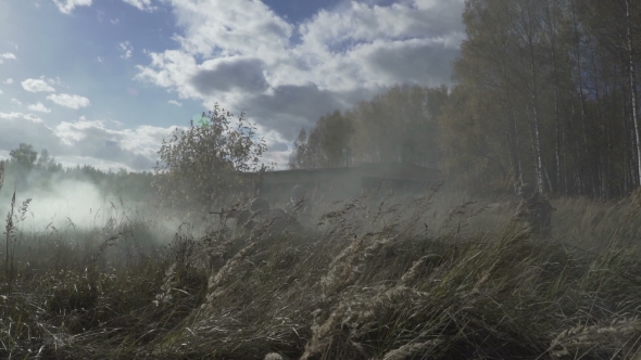 Military Smoke Go Through The Battle. Soldiers Are Attacking Through Smoke Ambush