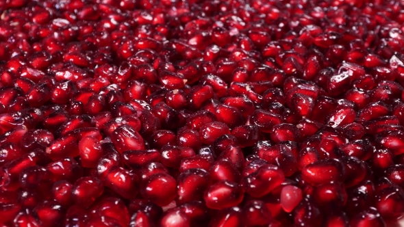 Rotating Fresh Pomegranate Seeds For Food