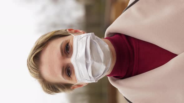 Young Woman Wearing Protective Medical Mask