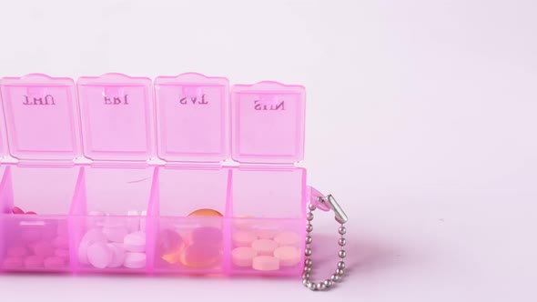 Top View of Medical Pill Box on Color Background