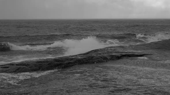 Surf on a Rocky Shore and Hail