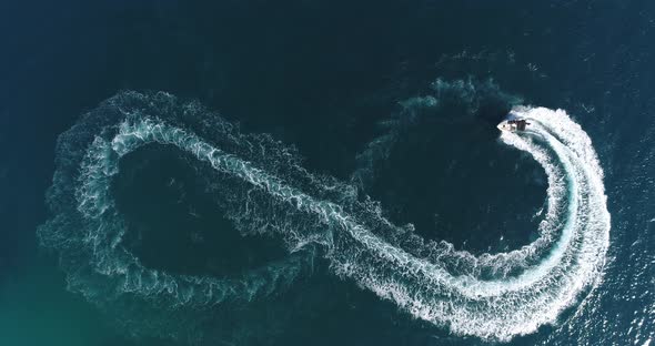 Aerial Top View of a White Pleasure Boat on a Summer Day