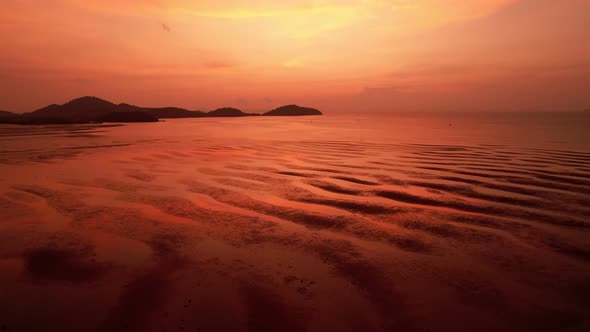 Aerial view Beautiful view sunset or sunrise over sea surface beautiful wave Amazing light twilight