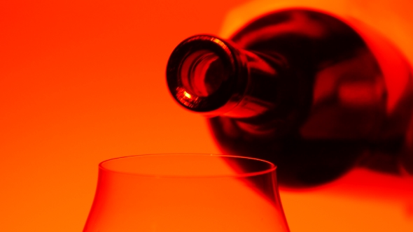 Red Wine Being Poured From Bottle To Glass, Orange,