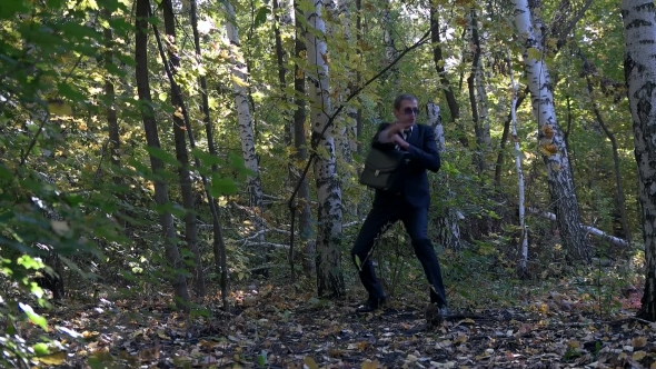 Businessman Playing In The Woods As a Child