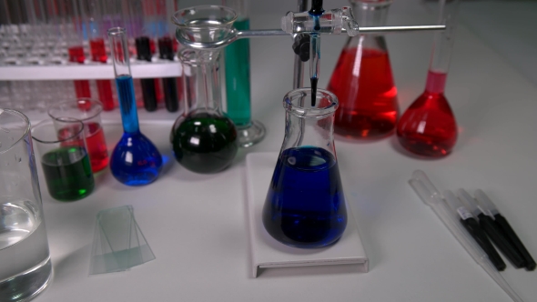 Technician In The Laboratory With Test Tubes