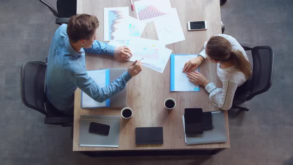 Colleagues Working in Office