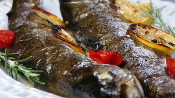 Delicious Trout Fish Baked With Lemon, Tomatoes And Spices