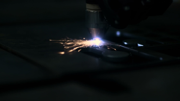 Plasma Laser Cutting Metal Sheet With Sparks