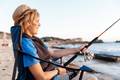 Teenage boy fishing at sea - PhotoDune Item for Sale