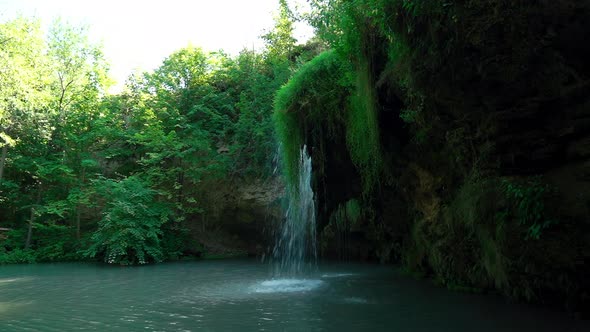 Waterfall In The City Park