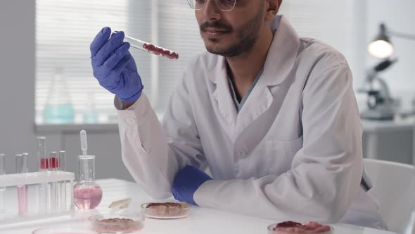 Scientist With Test Tube