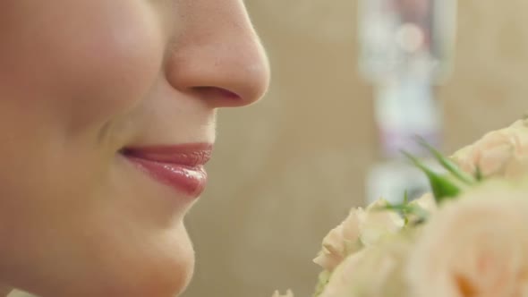 Woman Sniff Pink Roses Bouquet in Studio