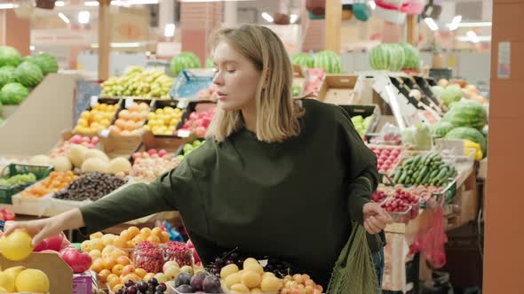 Young Woman Shopping for Fresh Produce at Market