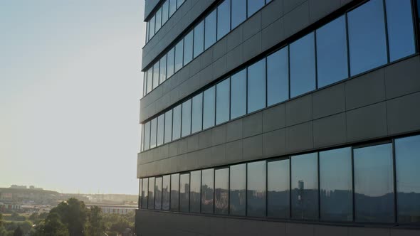 Windows of Empty Offices of Modern Mirrored Business Center During Covid19 Pandemic Isolation