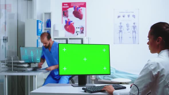 Assistant Giving Doctor Xray Image