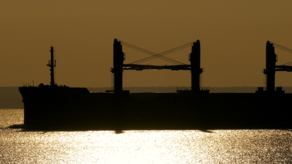 Ship Will Go On The Water Against The Setting Sun