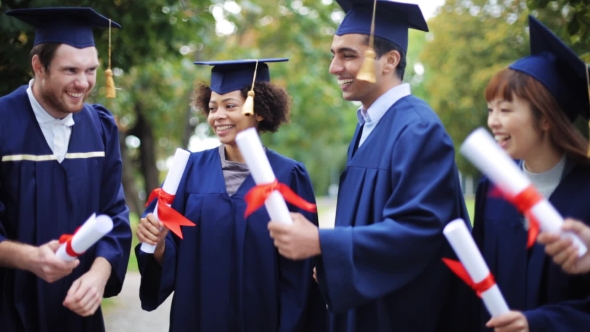 Happy Students In Mortar Boards With Diplomas 2