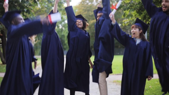 Happy Students In Mortar Boards With Diplomas 16