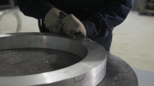 Industrial Engineer Working On Cutting a Metal And Steel Bar With Angle Grinder, Metallurgic Factory