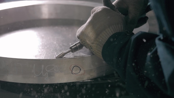 Industrial Engineer Working On Cutting a Metal And Steel Bar With Angle Grinder, Metallurgic Factory