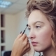 Make Up Artist Doing Professional Makeup Of Young Woman In Beauty Studio - VideoHive Item for Sale