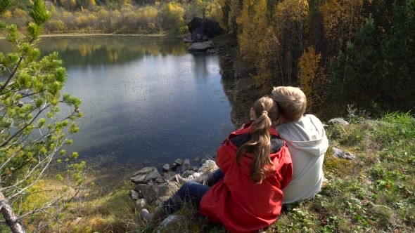 Pair of Lovers Embracing at the Lake Autumn