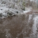 Snow And Rain Falls In a Puddle. - VideoHive Item for Sale
