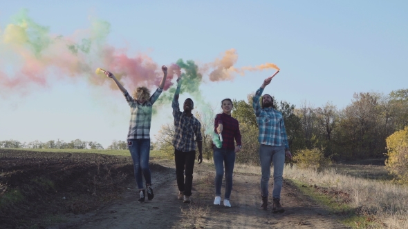 Youth With Colored Smoke Grenades