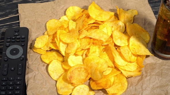 Potato Chips With Soda And Remote Control