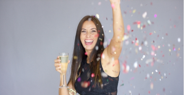 Vivacious Woman Having Fun At a New Year Party