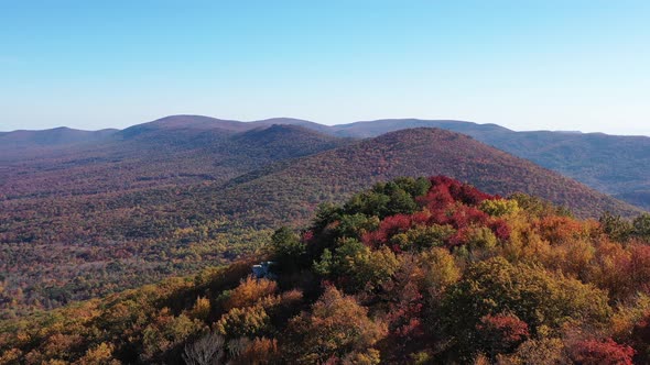 An aerial shot of Tibbet Knob and Great North Mountain in Autumn. The mountain range is the border b