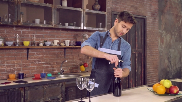 Adult Male With Friendly Smile Preparing Aperitif