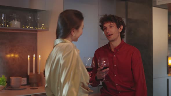 Couple Having Date at Home with Wine and Talks