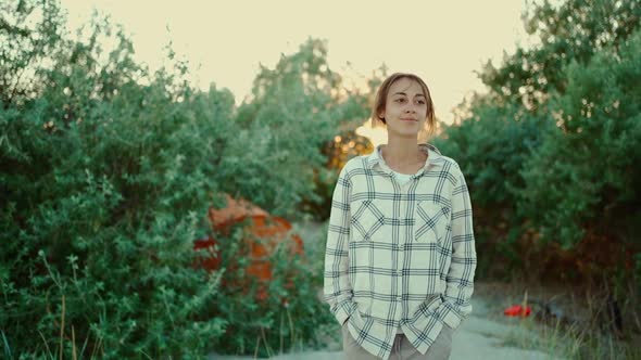 Carefree Attractive Mixed Race Woman Enjoying Walk Outdoors in Green Bushes on Wild Sea Sand Beach