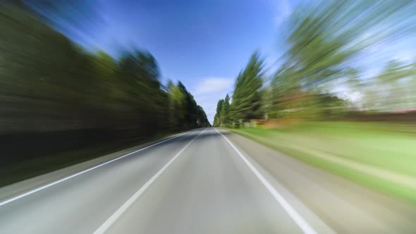 4K Point of View Hyperlapse Time-lapse of Car Driving Through Country Road.