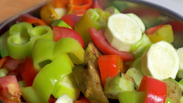 Adding Cut Vegetables In Salad