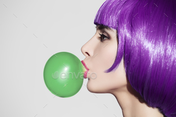 Green Bubble Chewing Gum. Gray Background.