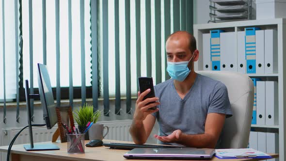 Employee Talking on Webcam with Leader